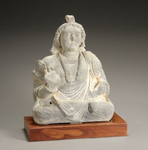 Горельеф с изображением бодхисаттвы Майтрея